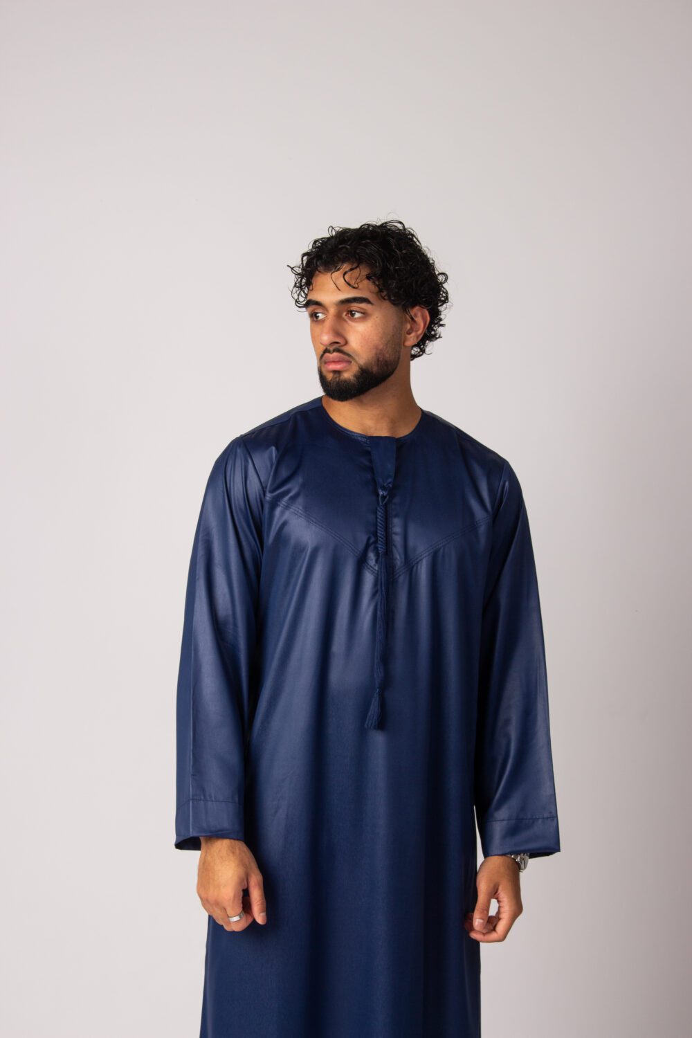 Shiny Dark Blue Mens Emirati Thobe Looking Forward