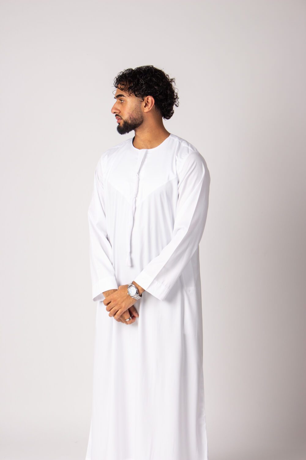 Shiny White Mens Emirati Thobe Looking Right