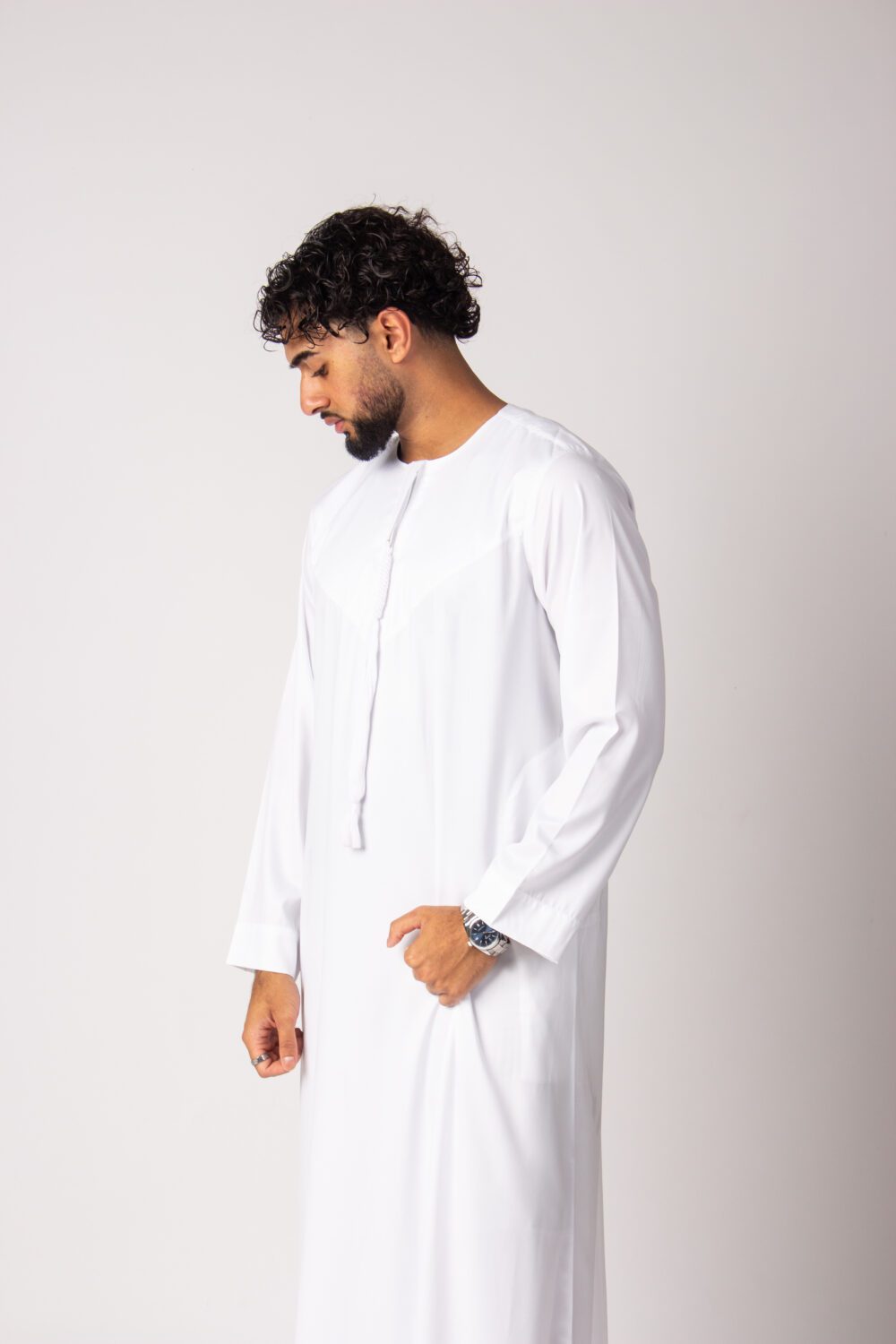 Shiny White Mens Emirati Thobe Looking Down