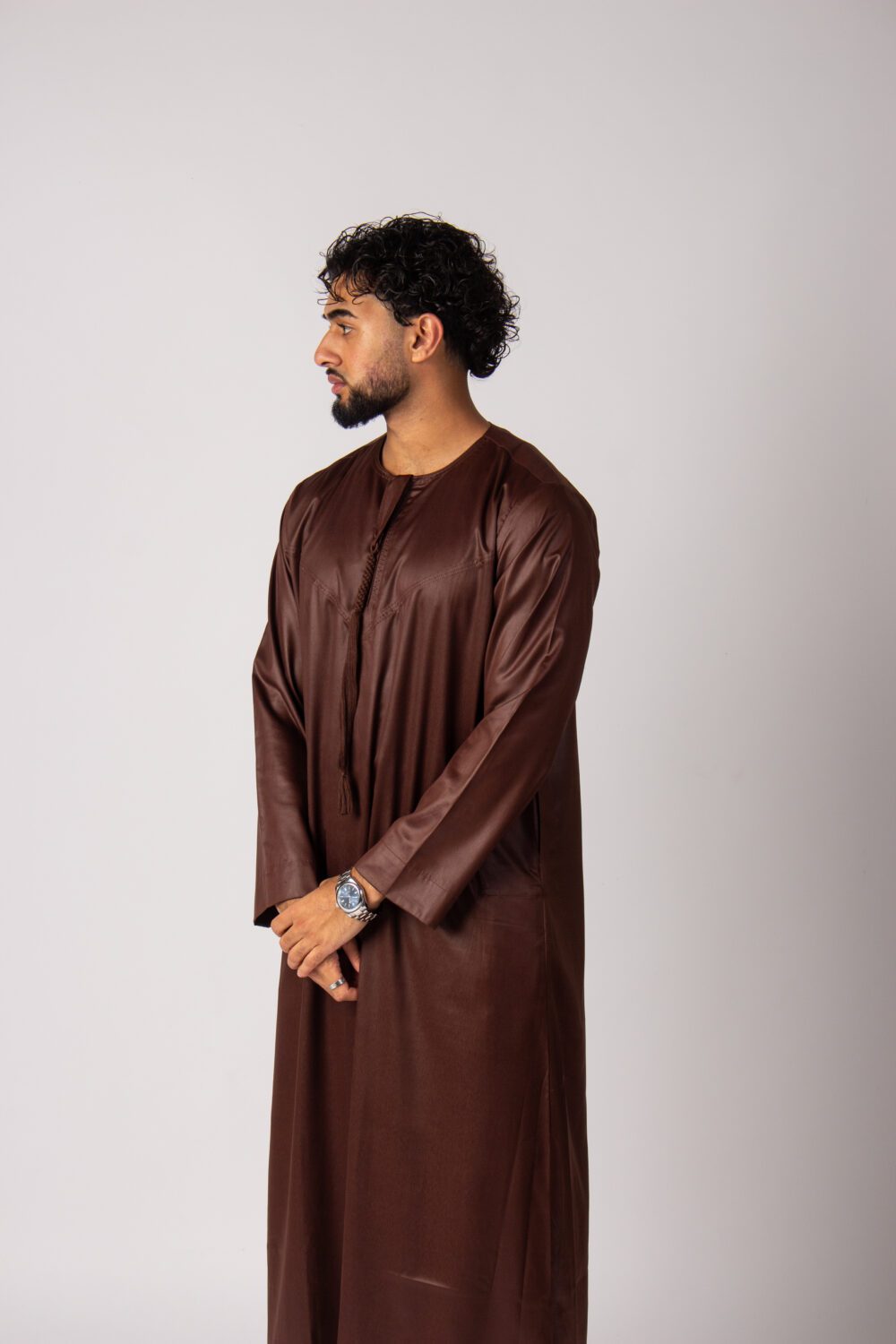 Shiny Brown Mens Emirati Thobe Looking Right