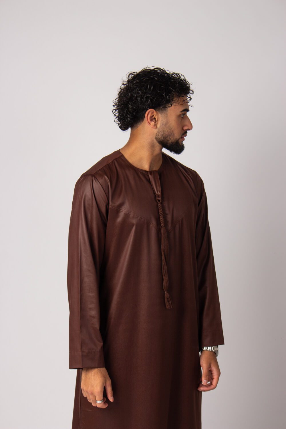 Shiny Brown Mens Emirati Thobe Looking Left