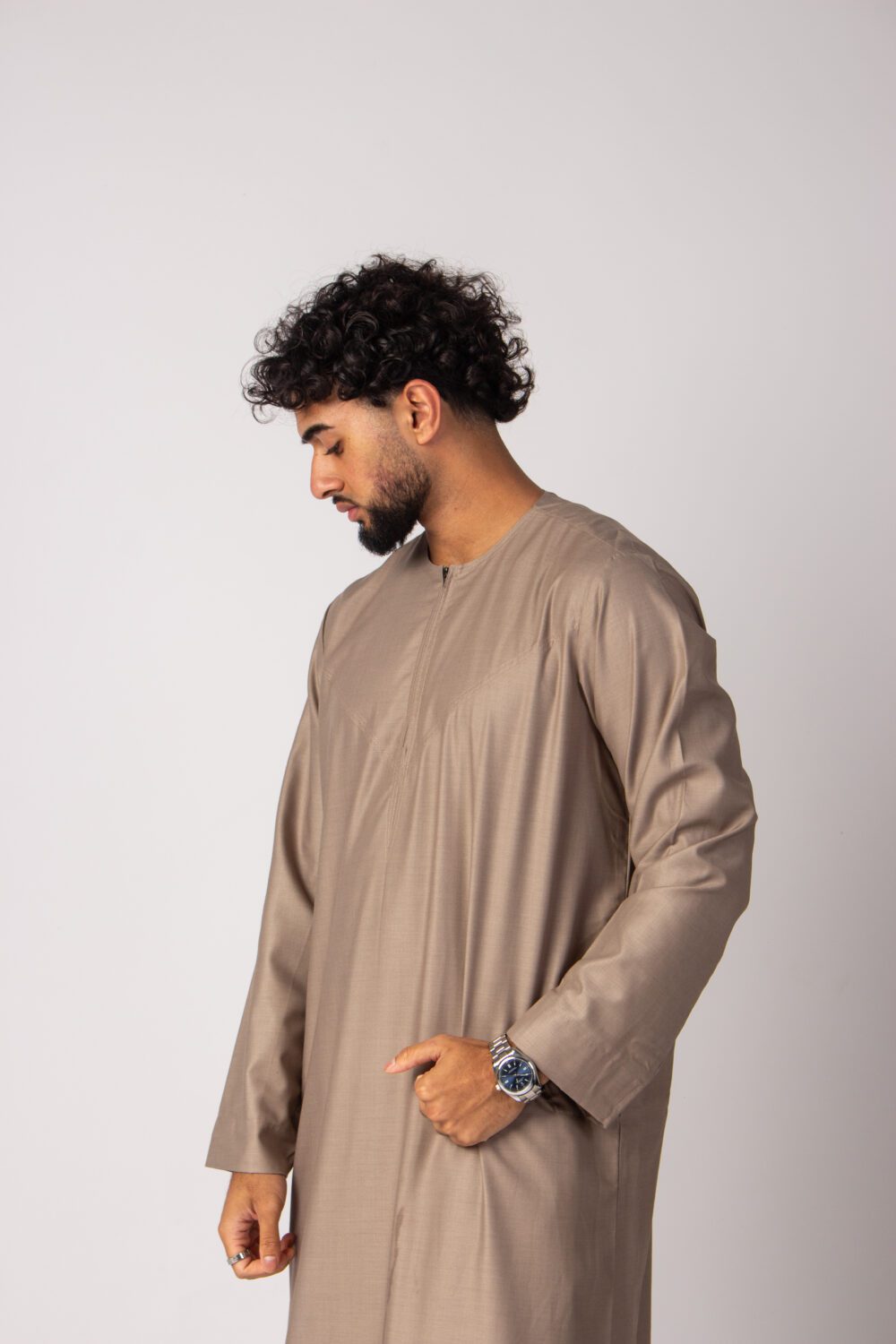 Matt Dark Beige Mens Omani Thobe Looking Down