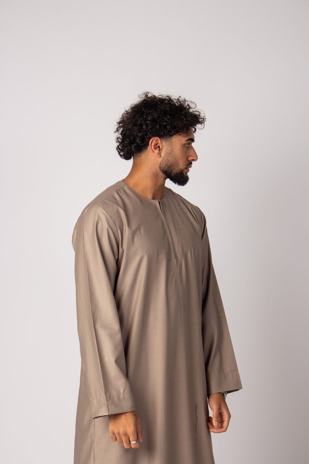 Matt Dark Beige Mens Omani Thobe Looking Left