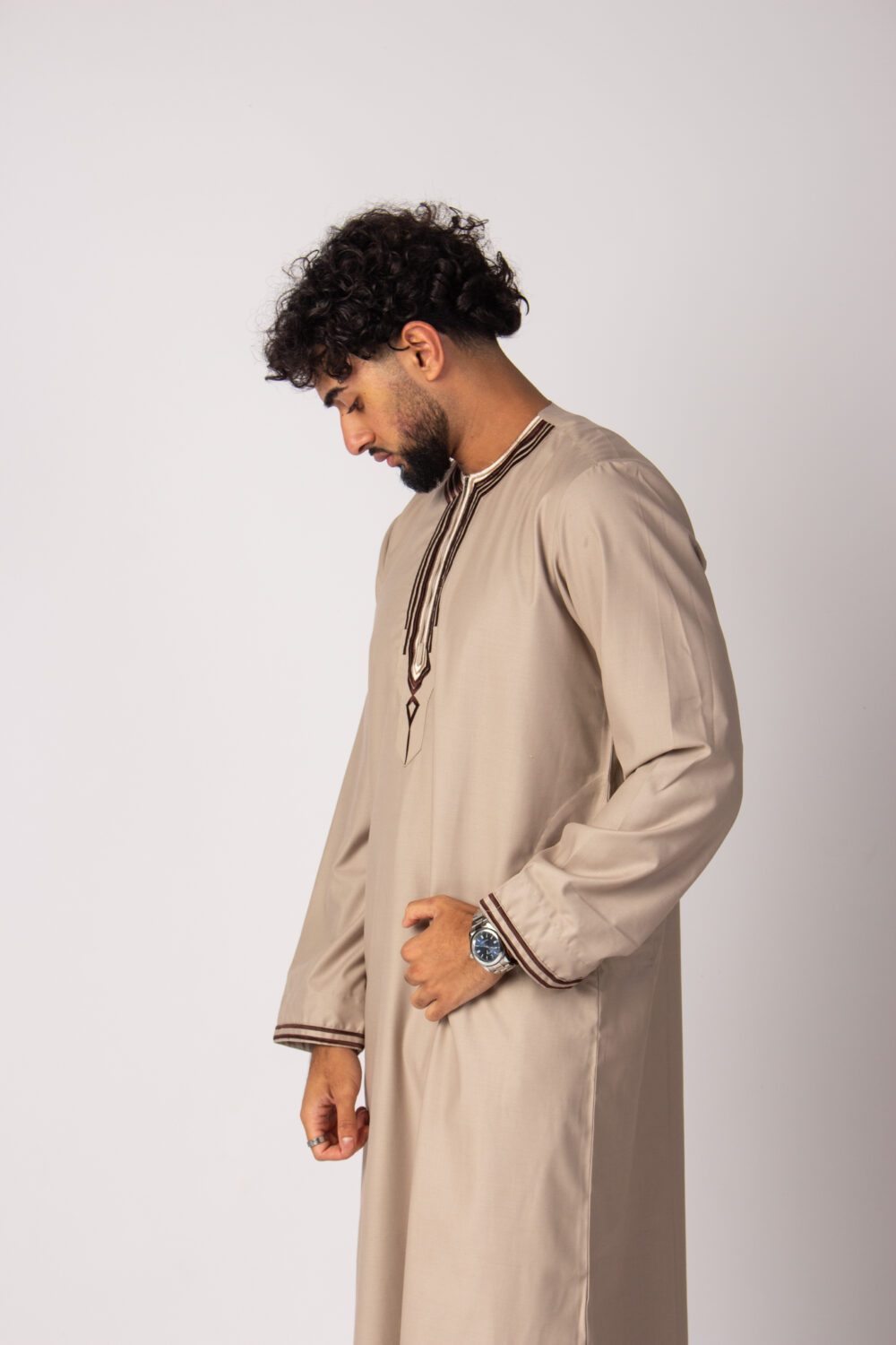 Matt Beige Mens Embroidery Thobe Looking Down