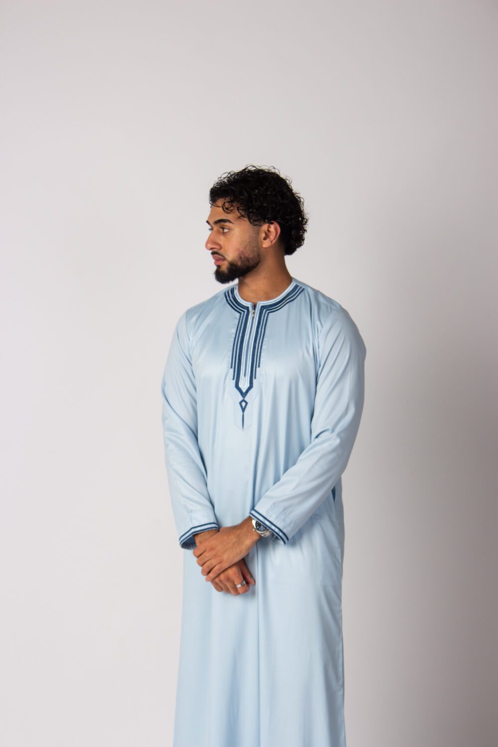 Shiny Baby Blue Mens Embroidery Thobe Looking Right