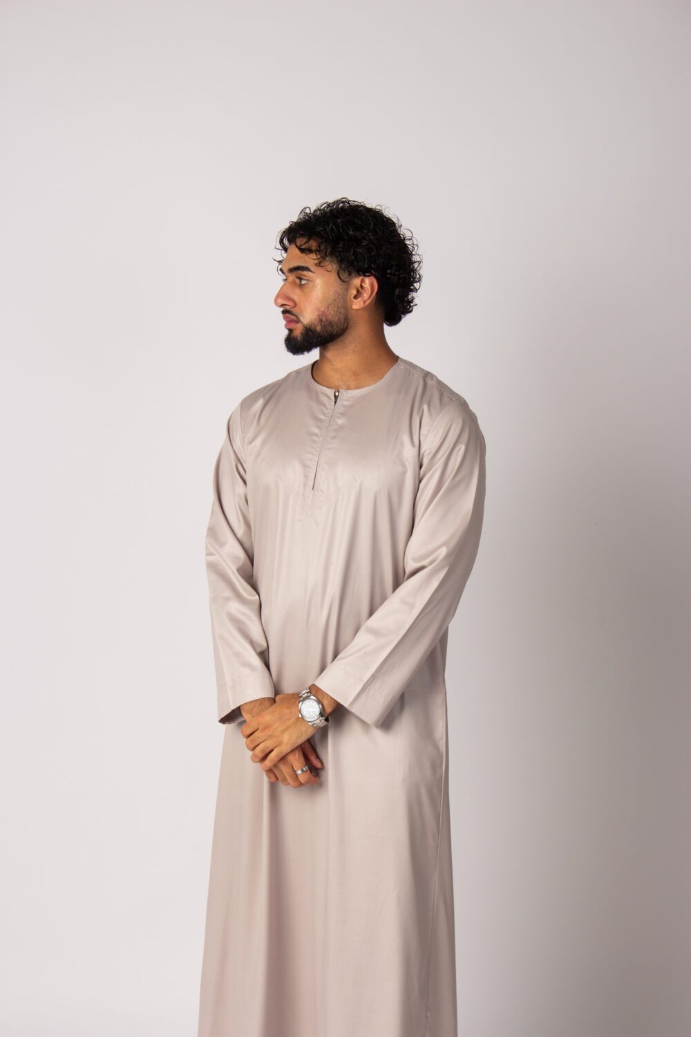 Shiny Beige Mens Omani Thobe Looking Right