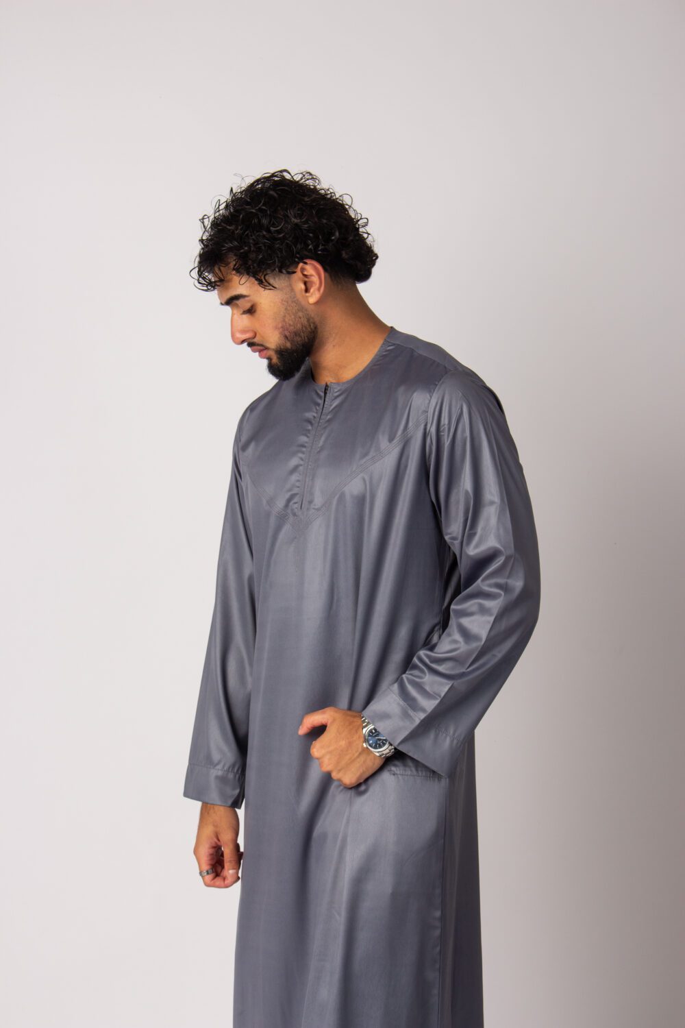 Shiny Grey Mens Omani Thobe Looking Down