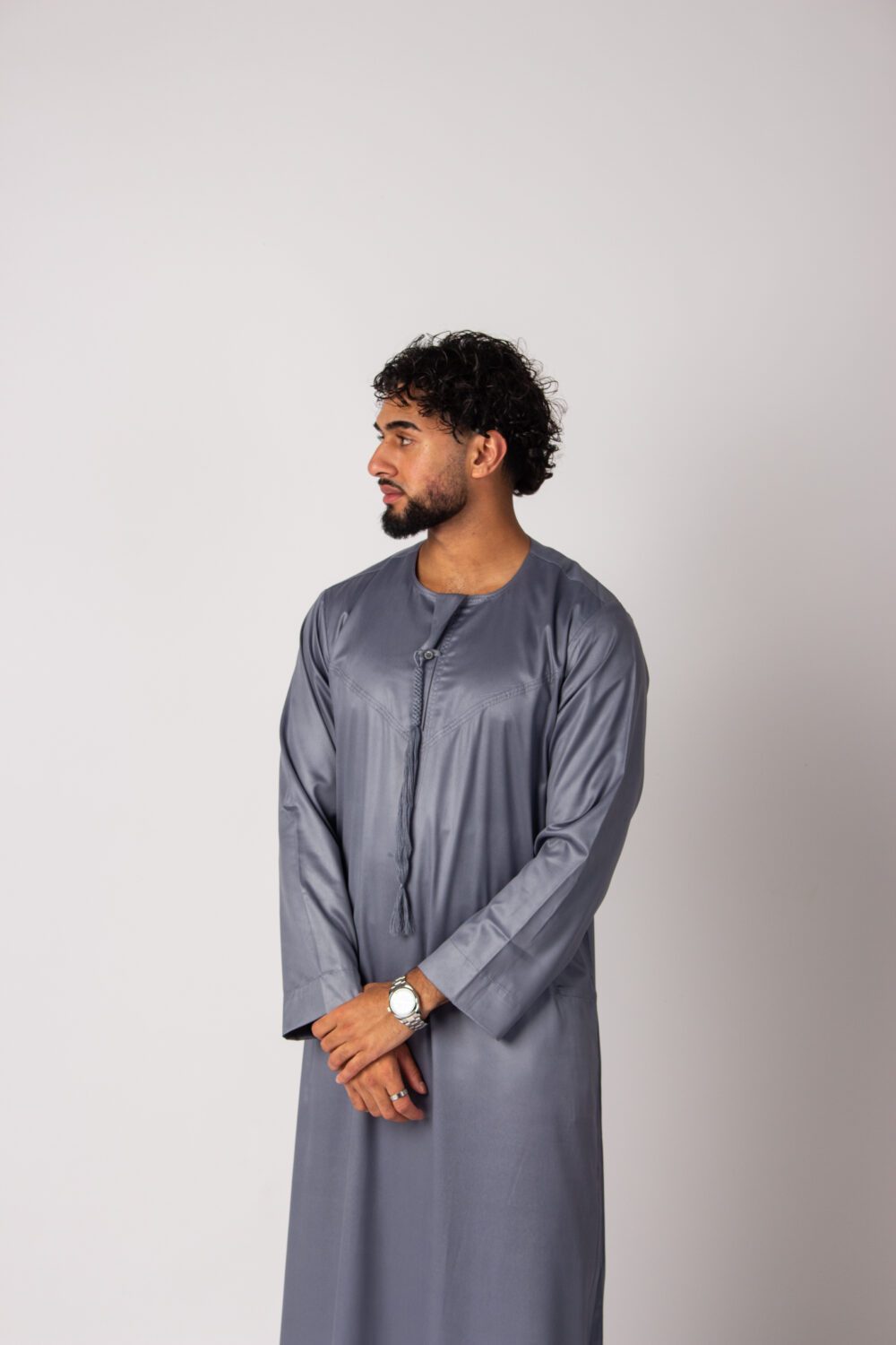 Shiny Grey Mens Emirati Thobe Looking Right